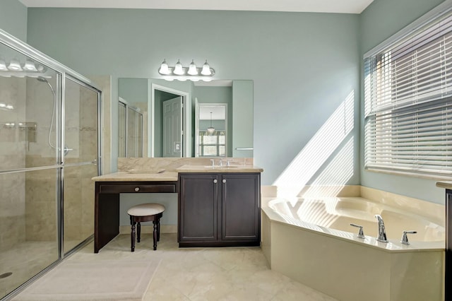 full bath with a garden tub, a shower stall, and vanity