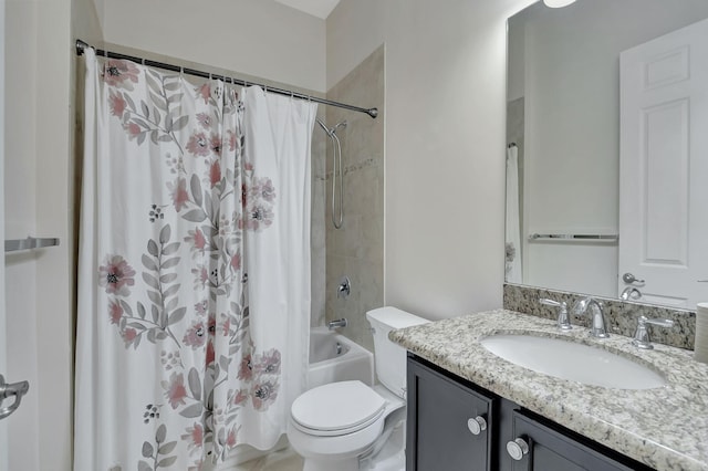 full bathroom with toilet, shower / bath combo, and vanity