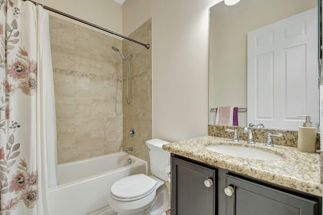 full bathroom featuring shower / bath combo, vanity, and toilet