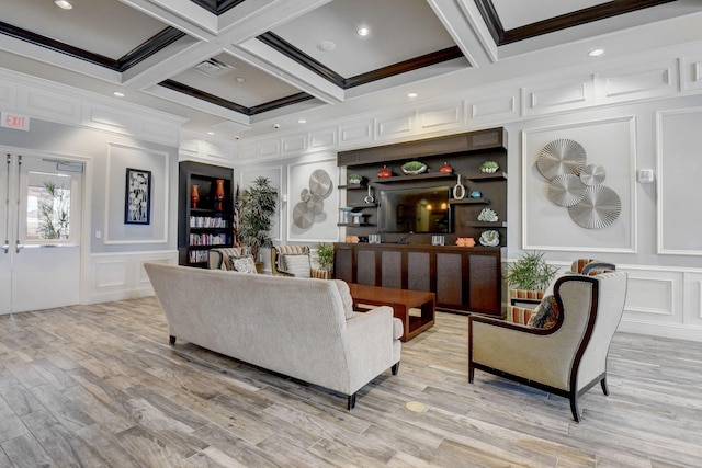 living area featuring crown molding, visible vents, a decorative wall, and beam ceiling