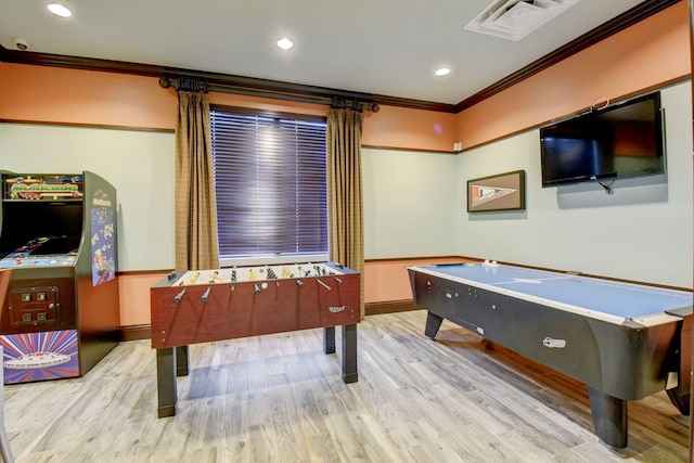 rec room featuring recessed lighting, visible vents, crown molding, and wood finished floors