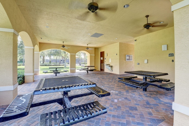 view of patio / terrace featuring a ceiling fan