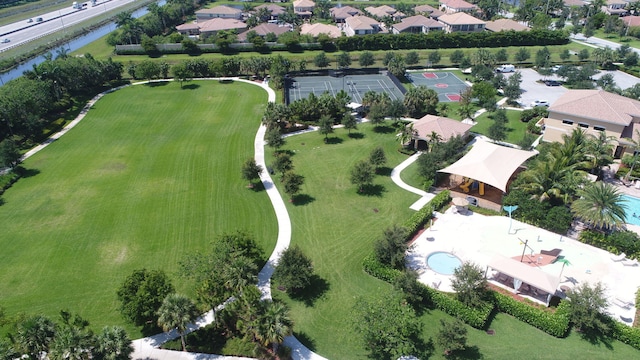 birds eye view of property with a residential view