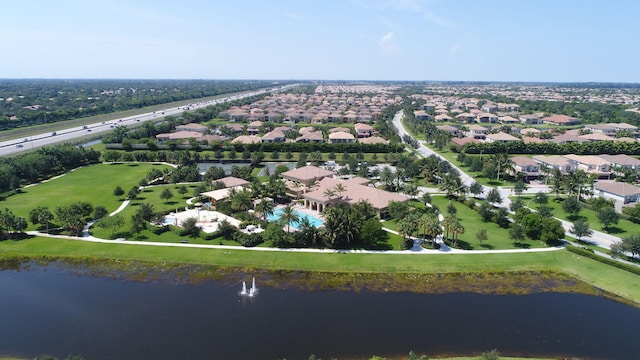 bird's eye view featuring a water view and a residential view