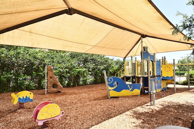 community play area featuring fence