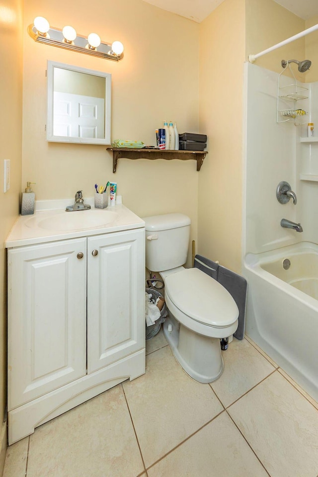 bathroom with vanity, shower / tub combination, tile patterned flooring, and toilet