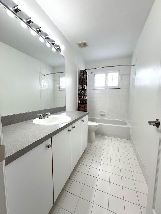 full bath with shower / tub combo with curtain, visible vents, toilet, vanity, and tile patterned floors