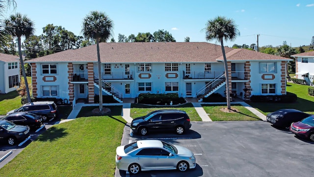 view of property featuring stairway