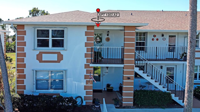 view of property with stairs