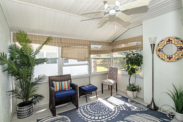 sunroom / solarium with lofted ceiling and a ceiling fan