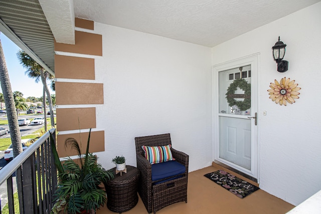 doorway to property with a balcony