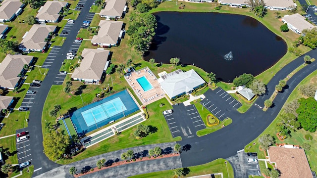 aerial view featuring a water view and a residential view