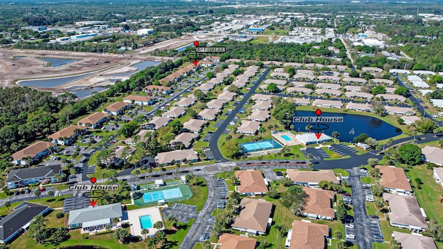 aerial view with a water view and a residential view