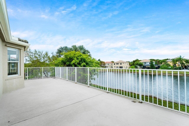 view of patio featuring a water view