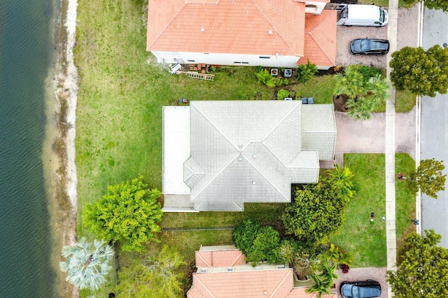 birds eye view of property featuring a water view