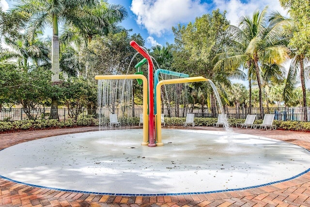 view of play area featuring fence