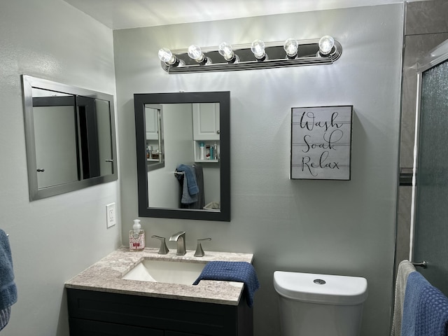 2014 Cambridge A, Deerfield Beach, FL 33442 - bathroom featuring an enclosed shower, toilet, and vanity