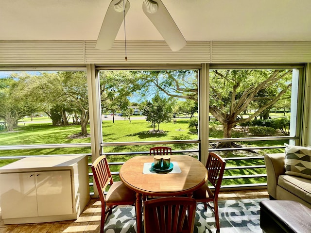 sunroom / solarium featuring a healthy amount of sunlight