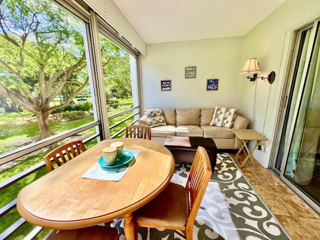 2014 Cambridge A, Deerfield Beach, FL 33442 - sunroom featuring tile patterned floors and outdoor lounge area