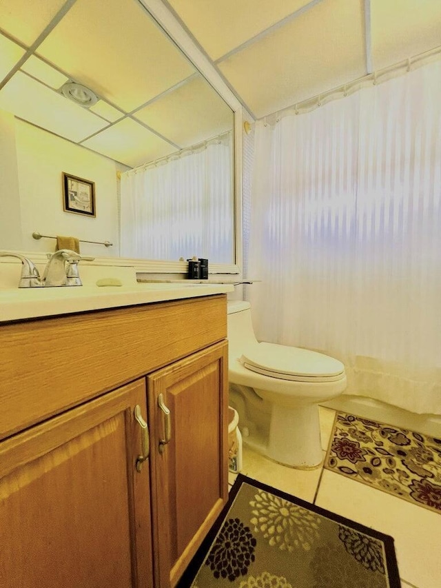 465 Saxony J, Delray Beach, FL 33446 - bathroom with tile patterned flooring, a shower with shower curtain, vanity, and toilet