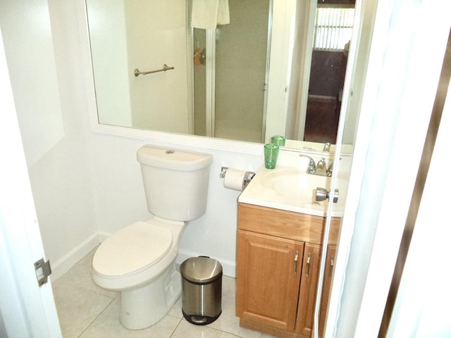 465 Saxony J, Delray Beach, FL 33446 - half bathroom with tile patterned flooring, baseboards, vanity, and toilet