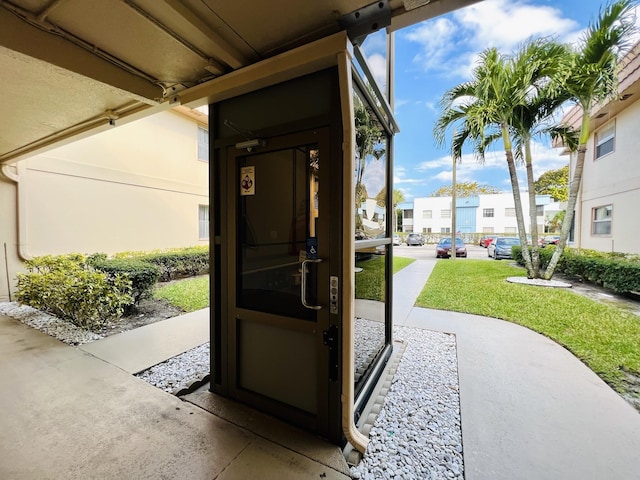 465 Saxony J, Delray Beach, FL 33446 - exterior space featuring a residential view and stucco siding