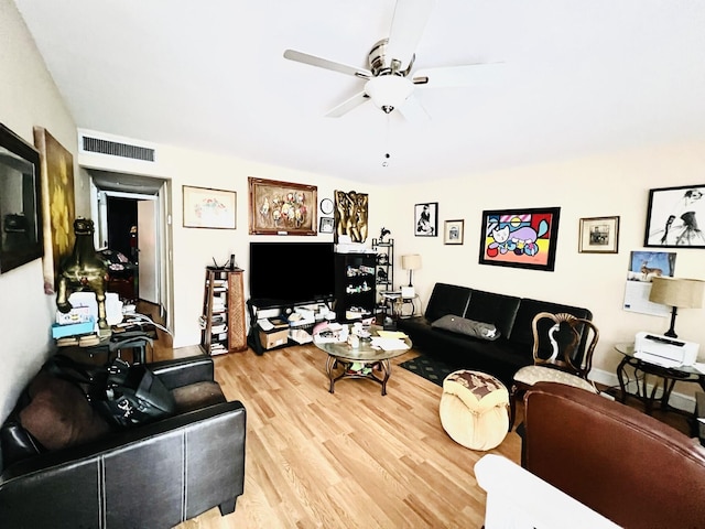 465 Saxony J, Delray Beach, FL 33446 - living area featuring ceiling fan, visible vents, and light wood-style floors