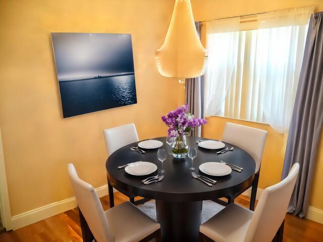 465 Saxony J, Delray Beach, FL 33446 - dining space featuring baseboards and wood finished floors