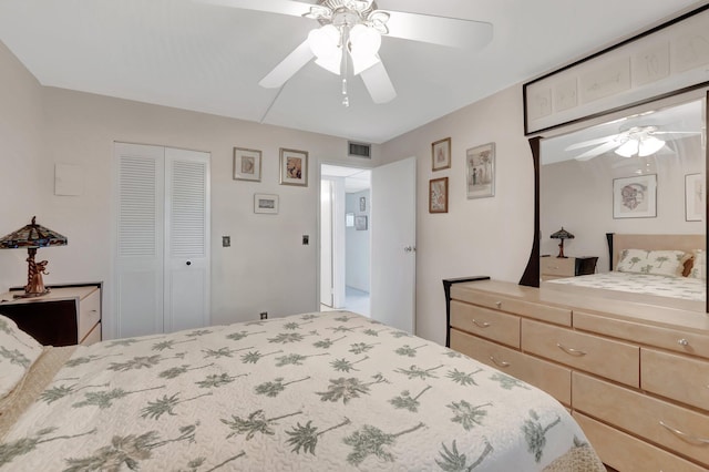 bedroom with a ceiling fan, a closet, and visible vents