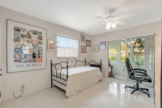 bedroom featuring a ceiling fan and light tile patterned floors