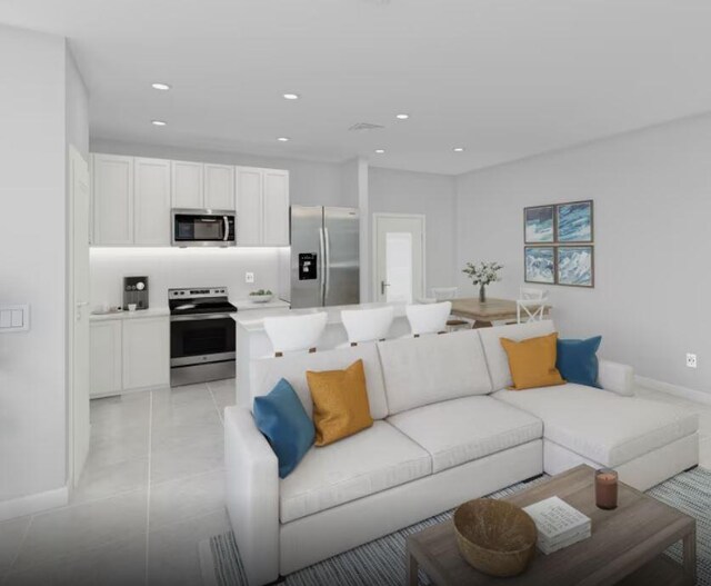 living room featuring recessed lighting, light tile patterned flooring, and baseboards