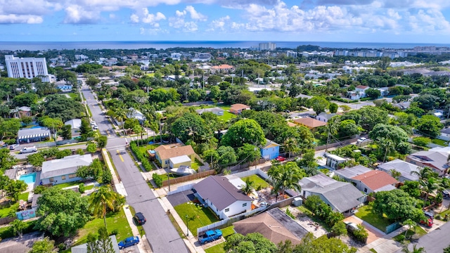 aerial view featuring a water view and a residential view