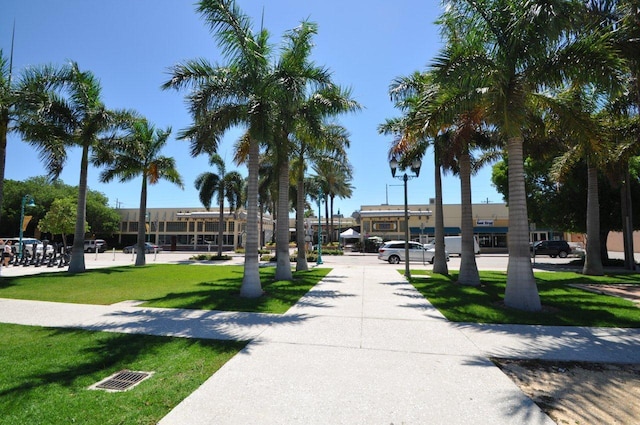 view of home's community with a lawn