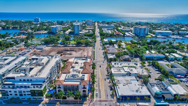 bird's eye view featuring a view of city and a water view