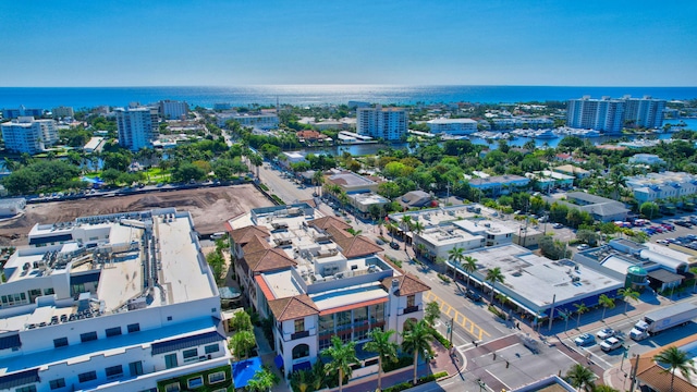 bird's eye view featuring a view of city and a water view