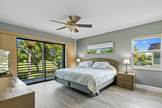 bedroom with access to exterior, baseboards, light wood finished floors, and a ceiling fan