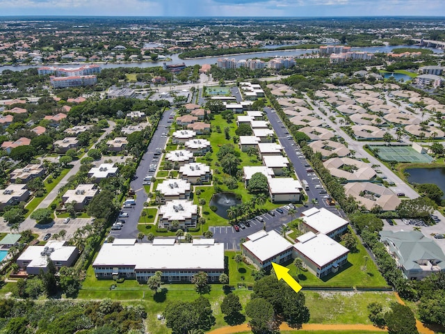 aerial view featuring a water view and a residential view