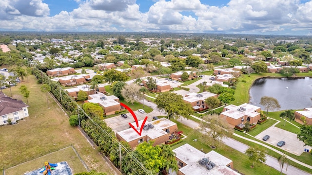 bird's eye view with a water view and a residential view