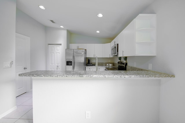 kitchen featuring a peninsula, open shelves, appliances with stainless steel finishes, and white cabinets