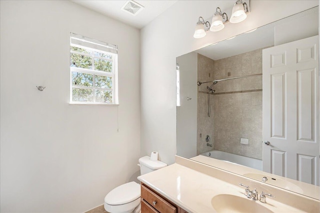 full bath with toilet, bathtub / shower combination, visible vents, and vanity