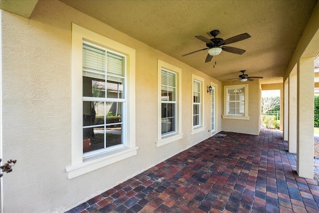 view of patio / terrace featuring a ceiling fan