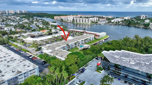 aerial view featuring a water view and a city view