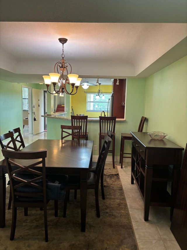 dining area with light tile patterned flooring