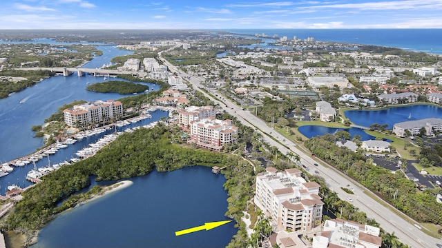 aerial view featuring a water view and a city view