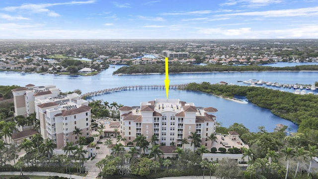 birds eye view of property featuring a water view