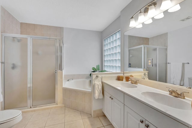 full bath with toilet, tile patterned flooring, a sink, and visible vents