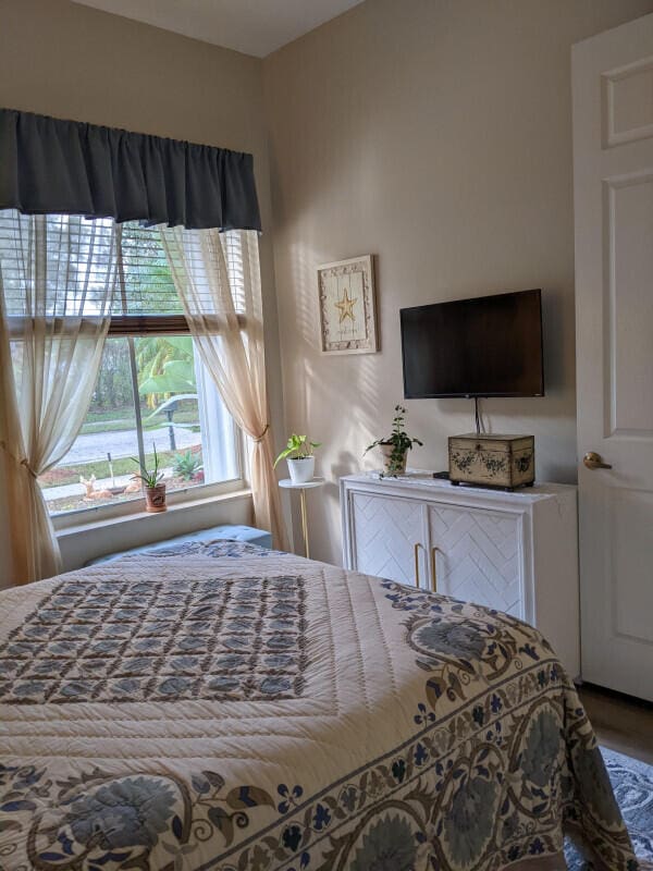 bedroom with wood finished floors