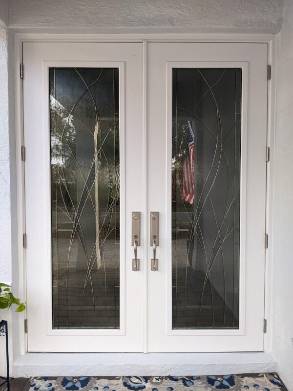 entrance to property featuring french doors