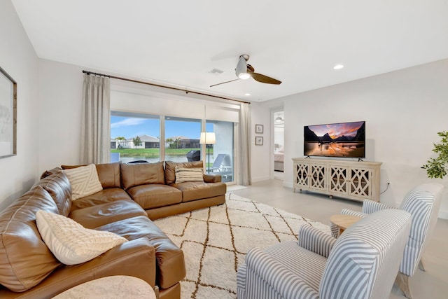 living area featuring recessed lighting, visible vents, and ceiling fan