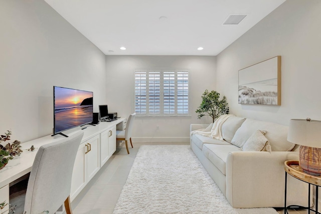 office area featuring baseboards, visible vents, and recessed lighting